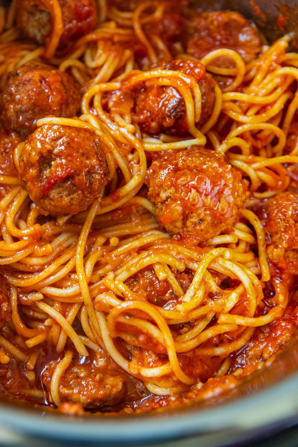 Instant pot spaghetti is presented in a pressure cooker.