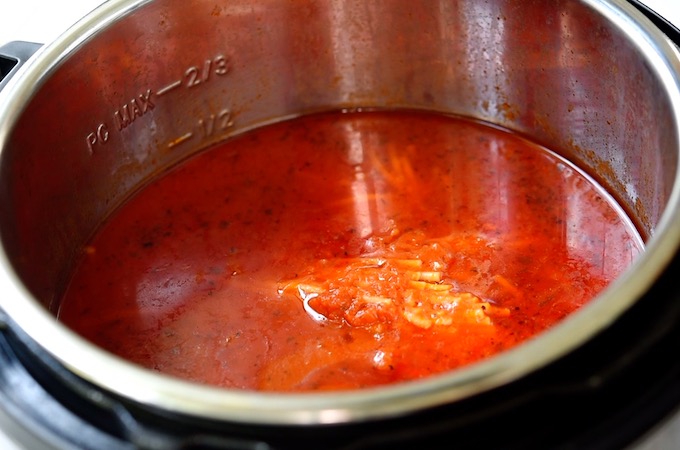 Spaghetti and noodles in water in instant pot.