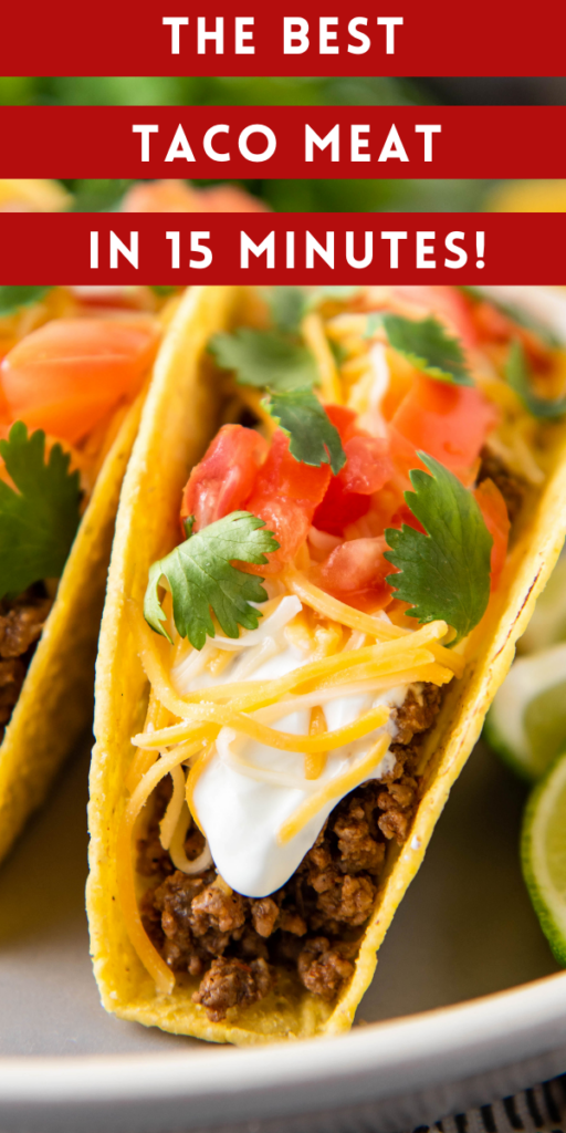 Up close image of ground taco meat in a crispy taco shell with toppings.