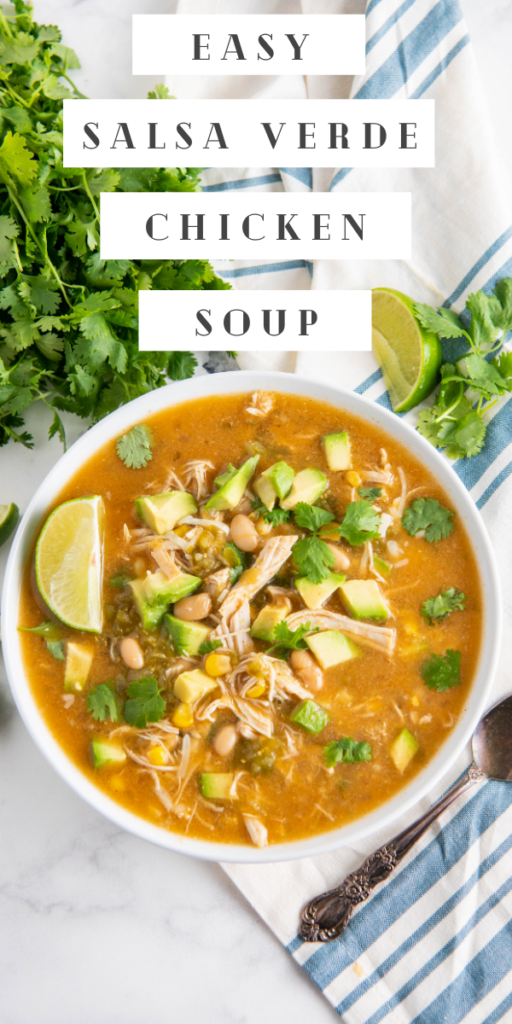 Pinterest image of crockpot chicken soup in a white bowl with a napkin and cilantro with wording on top.