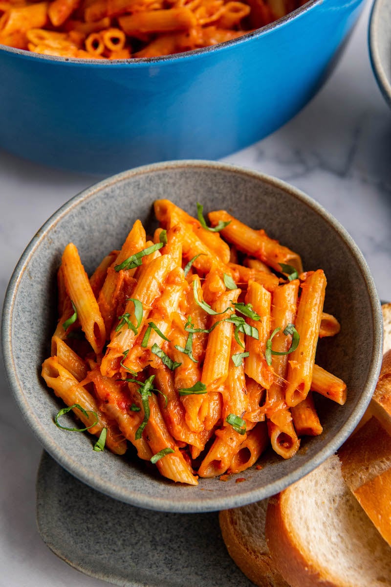 Freshly cut parsley garnishes a bowl of one pot pasta