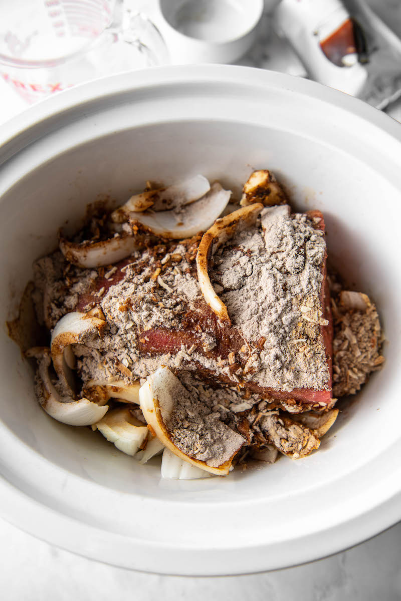 The ingredients are all in the Crockpot, uncooked.