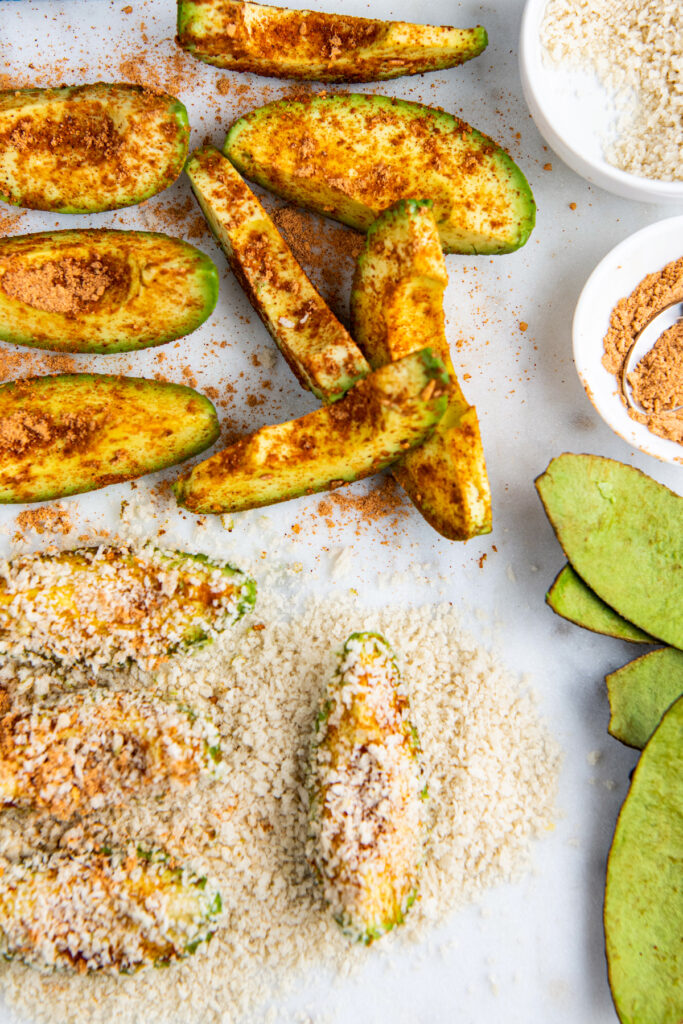Sliced avocado with seasonings and breadcrumbs