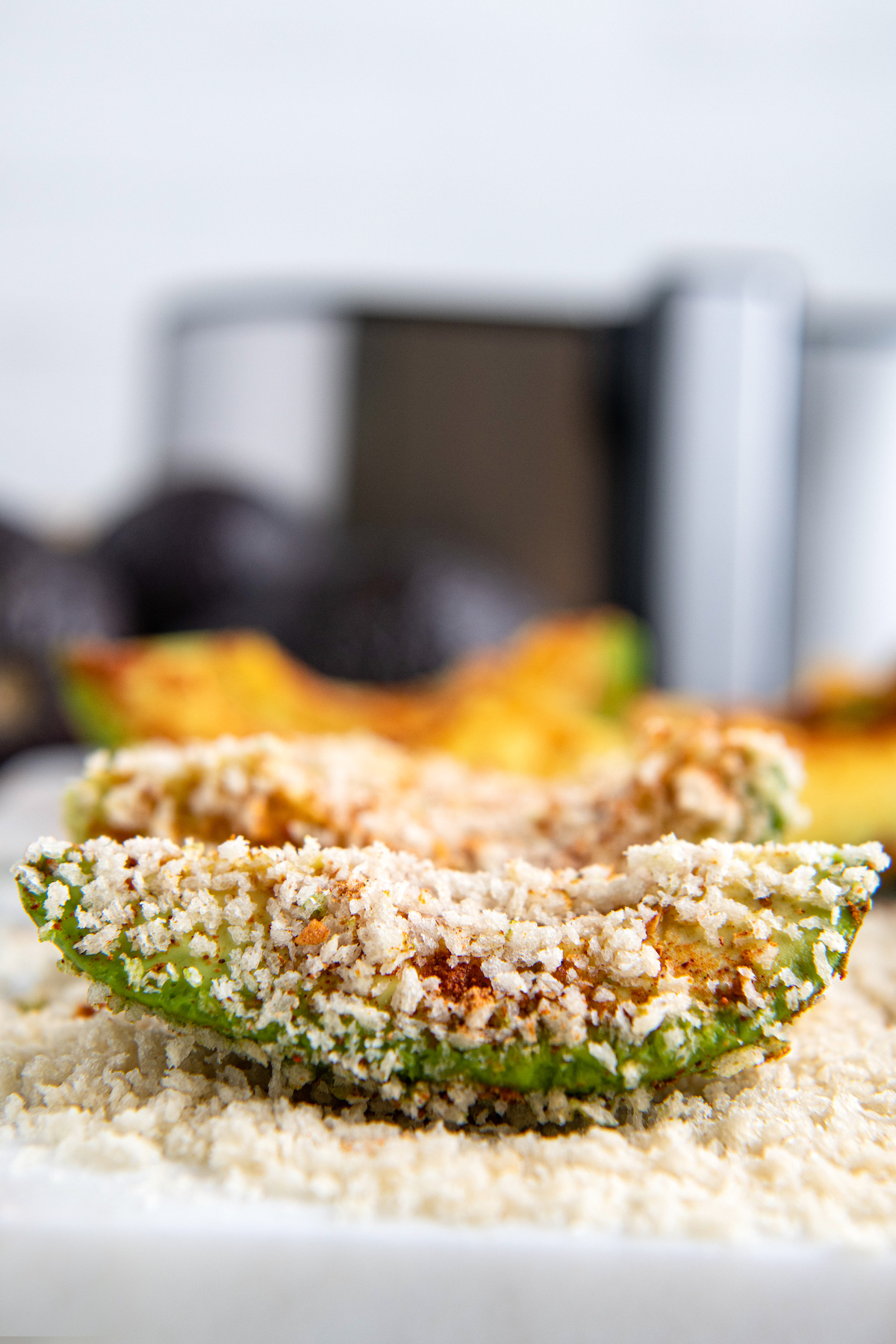 Avocado sliced with breadcrumbs 