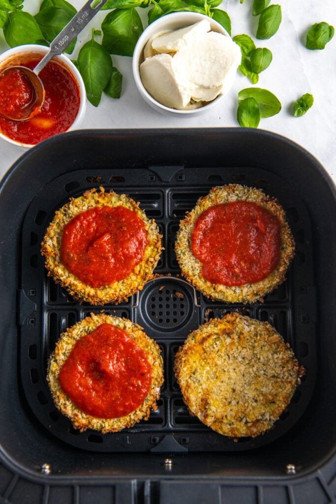 Eggplant parmesan with marinara added to the top