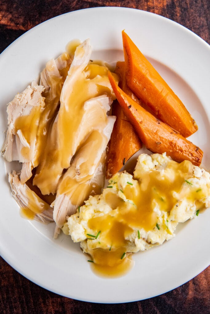crockpot turkey breast on a serving plate
