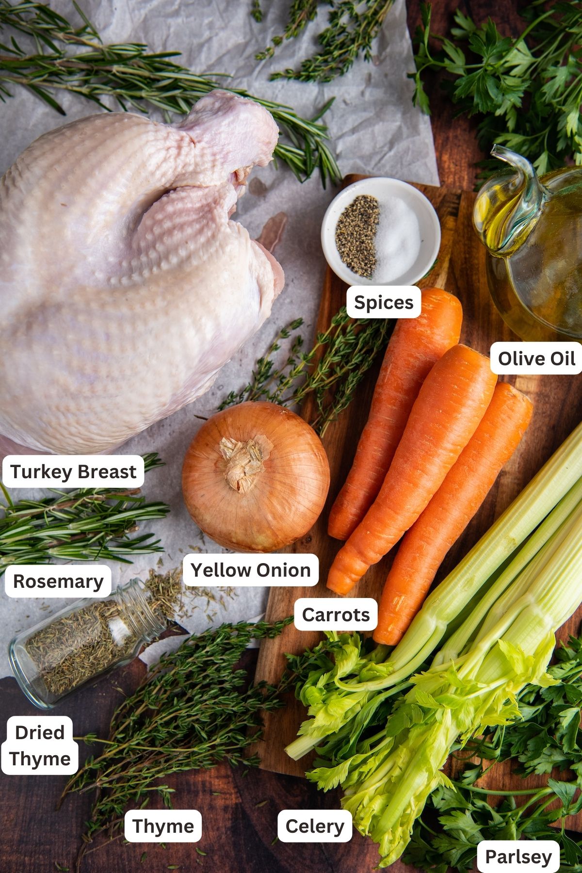 Ingredients to make Crockpot Turkey Breast recipe in order from top to bottom: turkey breast, spices, olive oil, rosemary, yellow onion, carrots, dried thyme, thyme, celery, parsley. 