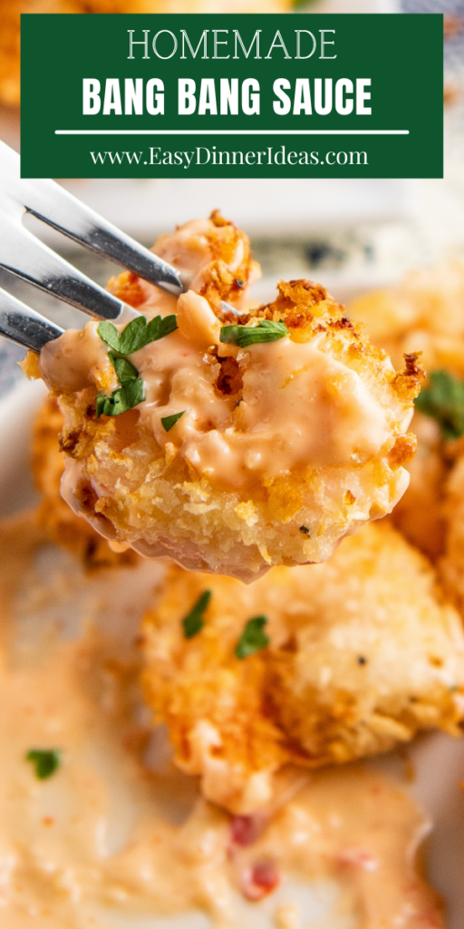 Crispy fried shrimp with bang bang sauce on a fork.