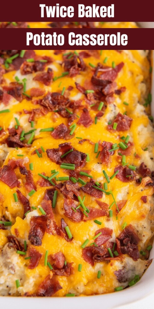 Twice baked potatoes in a casserole dish with cheese, bacon and chives on top.