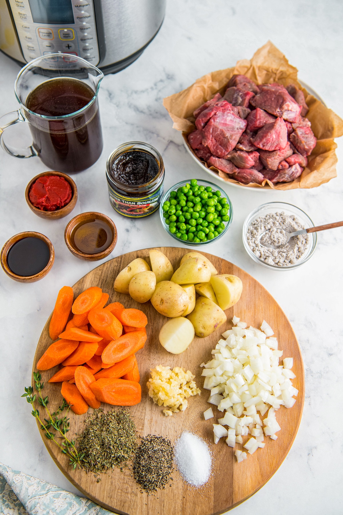 This easy Instant Pot Beef Stew is filled with hearty, tender beef, potatoes, carrots, and peas in a rich gravy to create a bowl of comfort! If you’re craving stew, but don’t have a lot of time, this pressure cooker recipe yields tender, delicious stew in a fraction of the time.