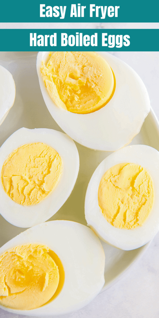 Sliced cooked eggs on a white plate.
