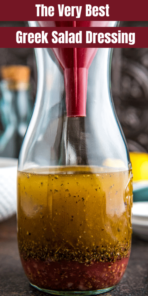 Salad dressing layered in a glass jar with a funnel.