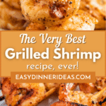 Grilled shrimp on skewers with lemon wedges.