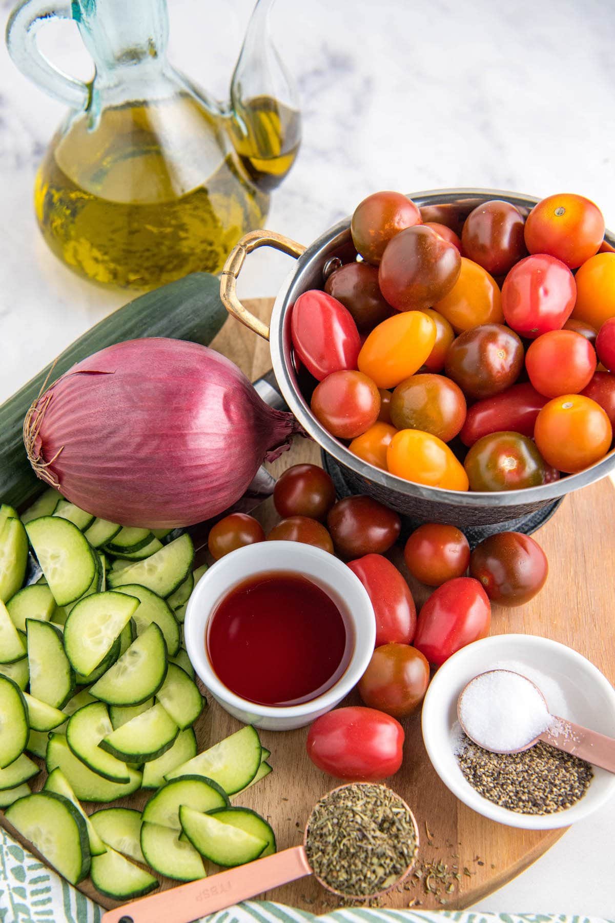 Ingredients arranged on a cutting board and in bowls.