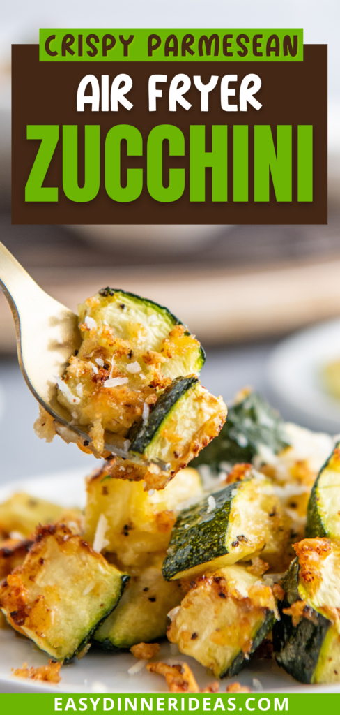 A fork picking up a bite of air fryer zucchini from a plate.