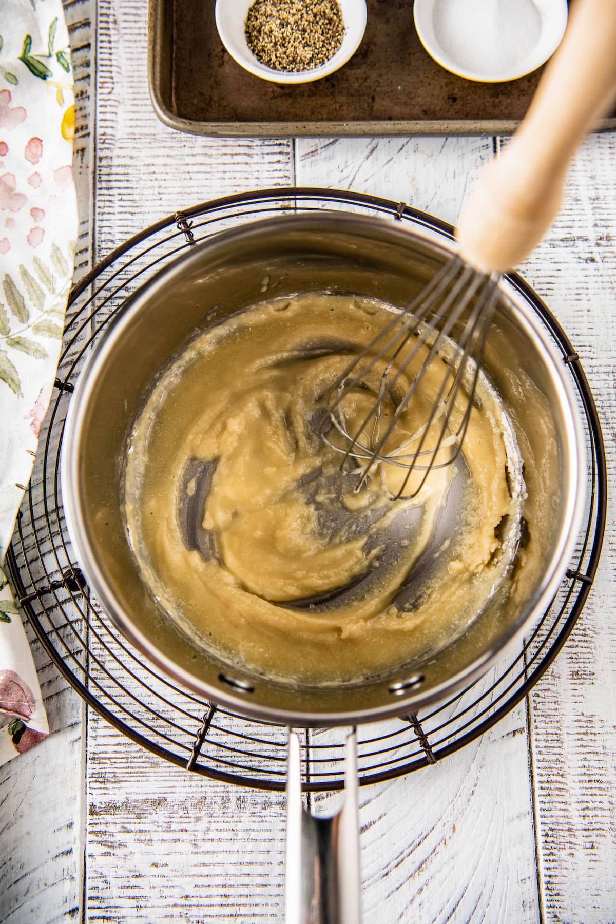 whisking flour and butter together in a saucepot