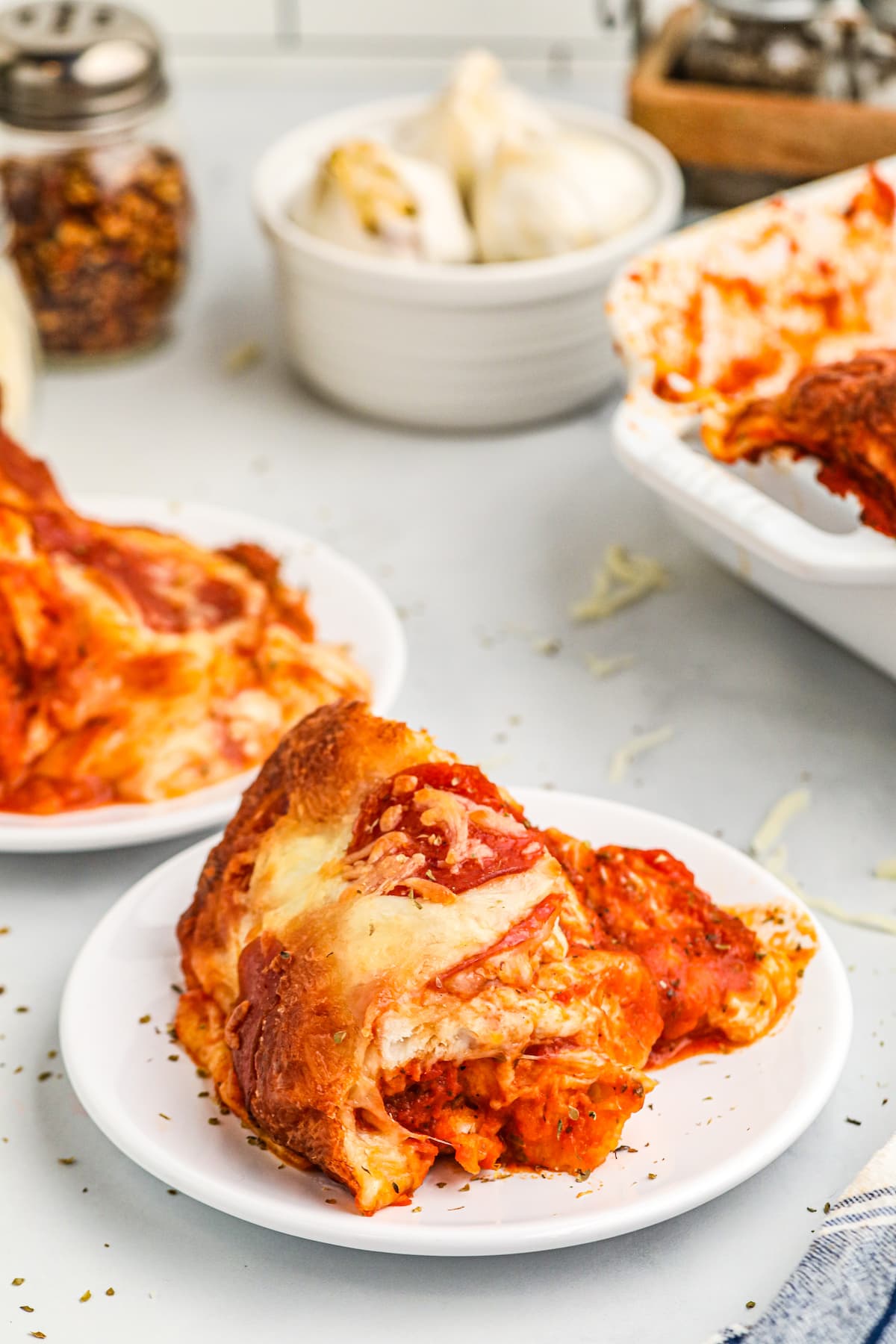 a large piece of pizza cut out from pizza casserole