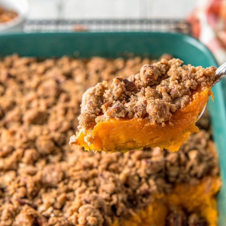 a slice of sweet potato casserole with crumbled topping
