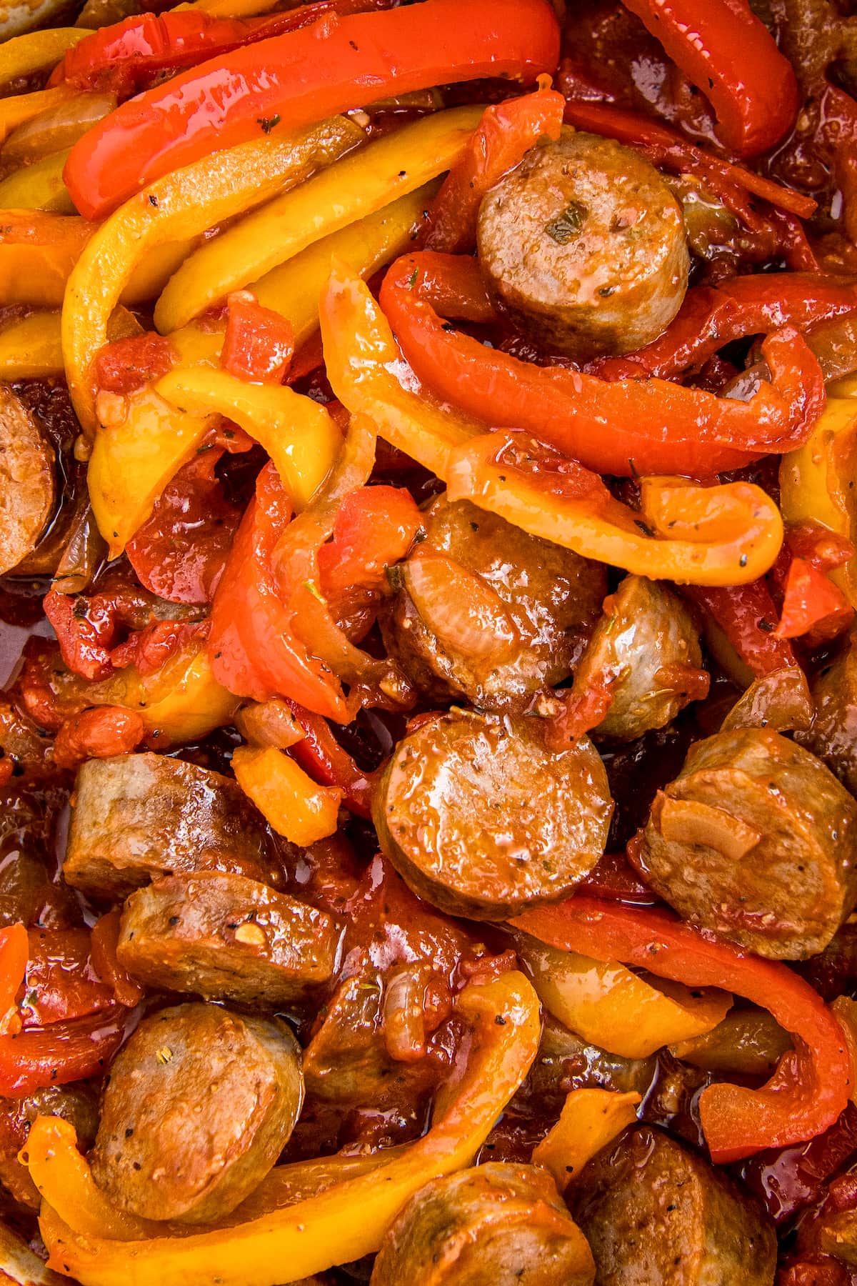 Sausage, Peppers, and Onions all together in a large pot.