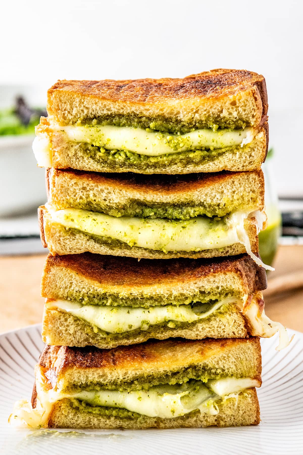 stack of open-faced Open-faced grilled cheese sandwiches with pesto