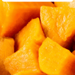 Up close image of boiled cubed sweet potatoes.