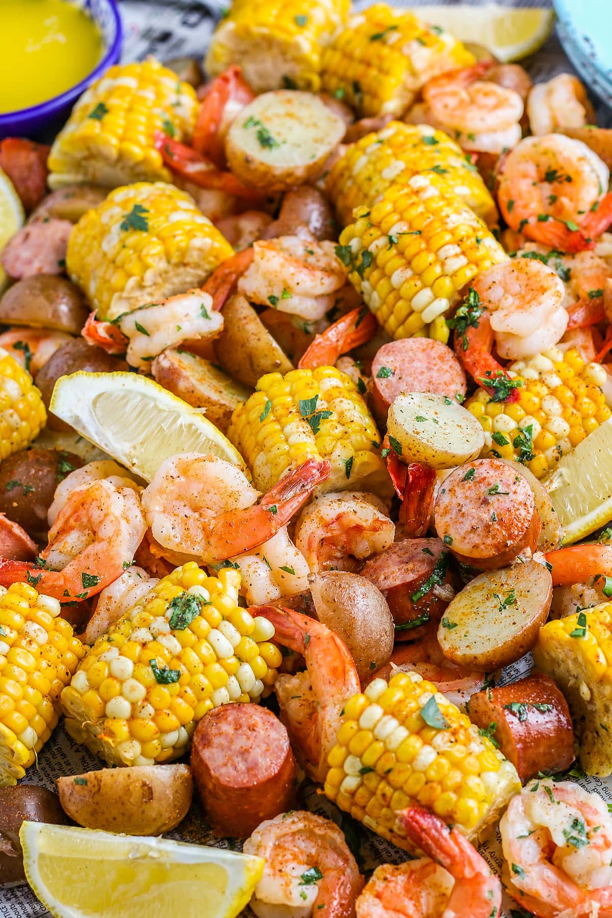 boiled shrimp with corn on the cob, sausage, and potatoes