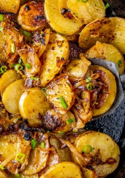 fried potatoes with onions in a skillet