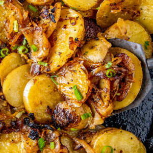 fried potatoes with onions in a skillet