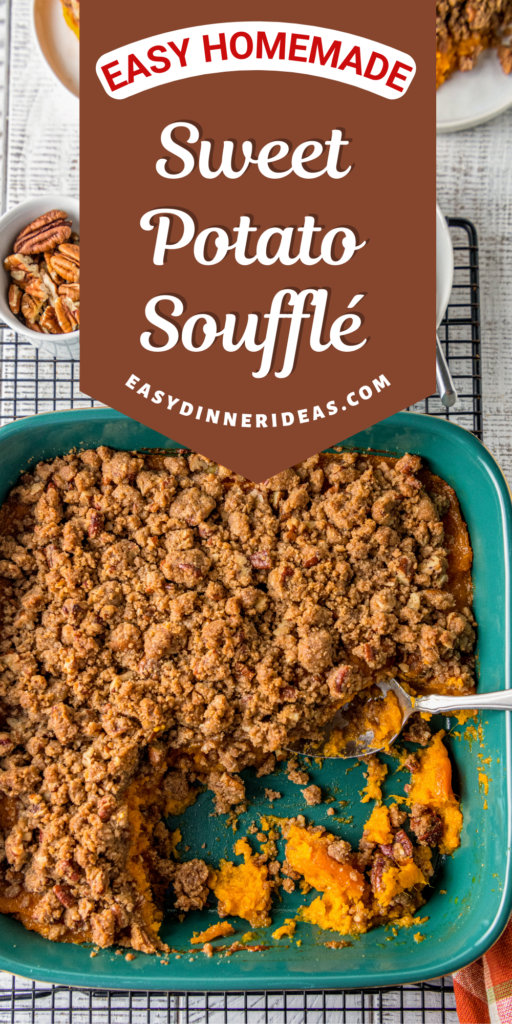 Sweet potato souffle in a green casserole dish with a serving spoon.