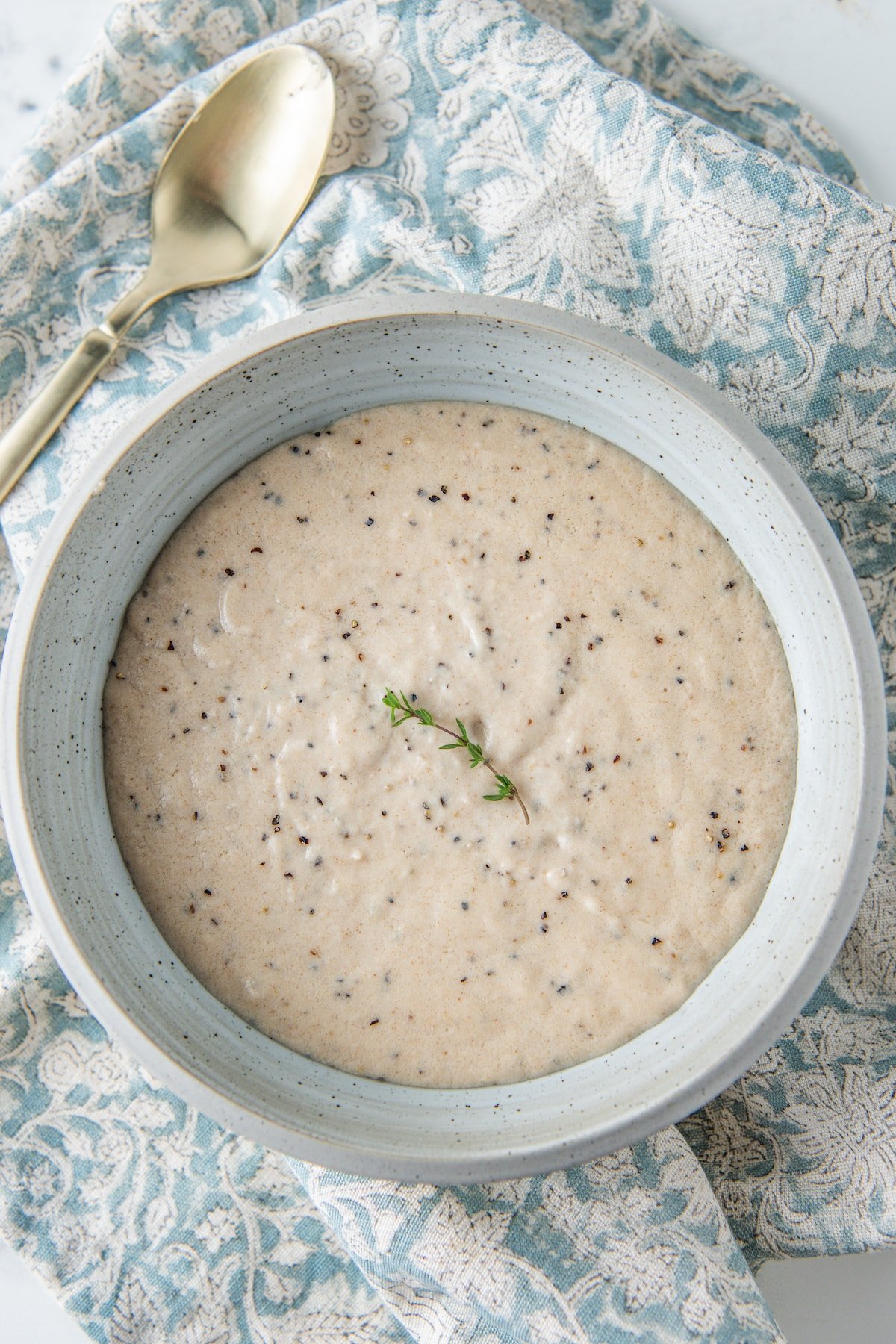 a bowl with white gravy