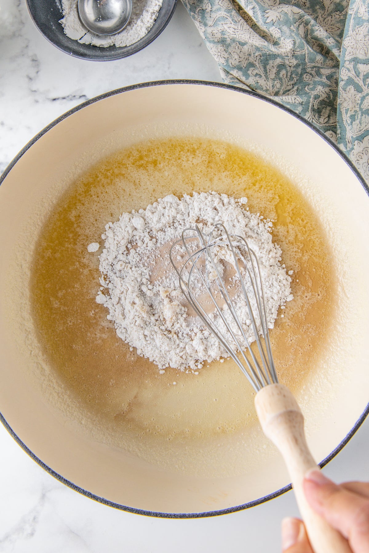 whisking flour into melted butter