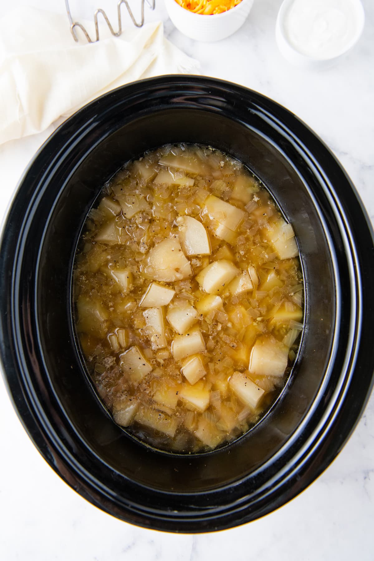 potatoes in broth in a slow cooker