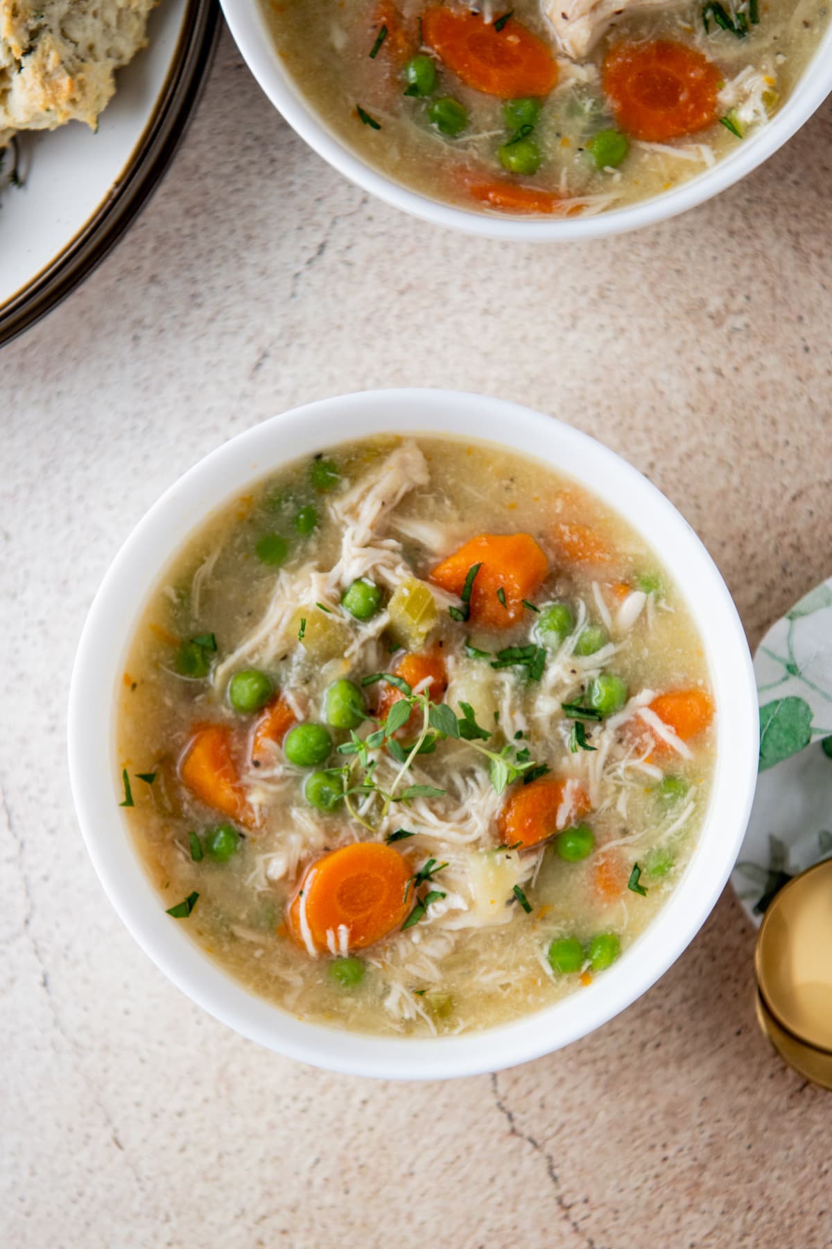 Crockpot chicken stew in a white bowl