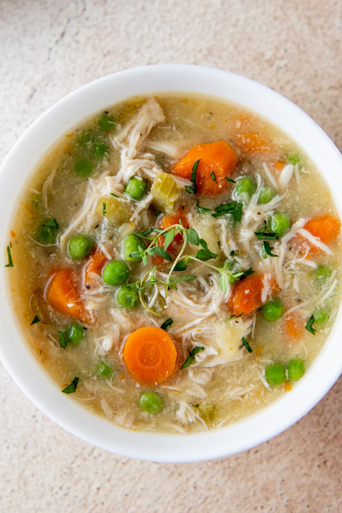 chicken stew with carrots, peas, and celery