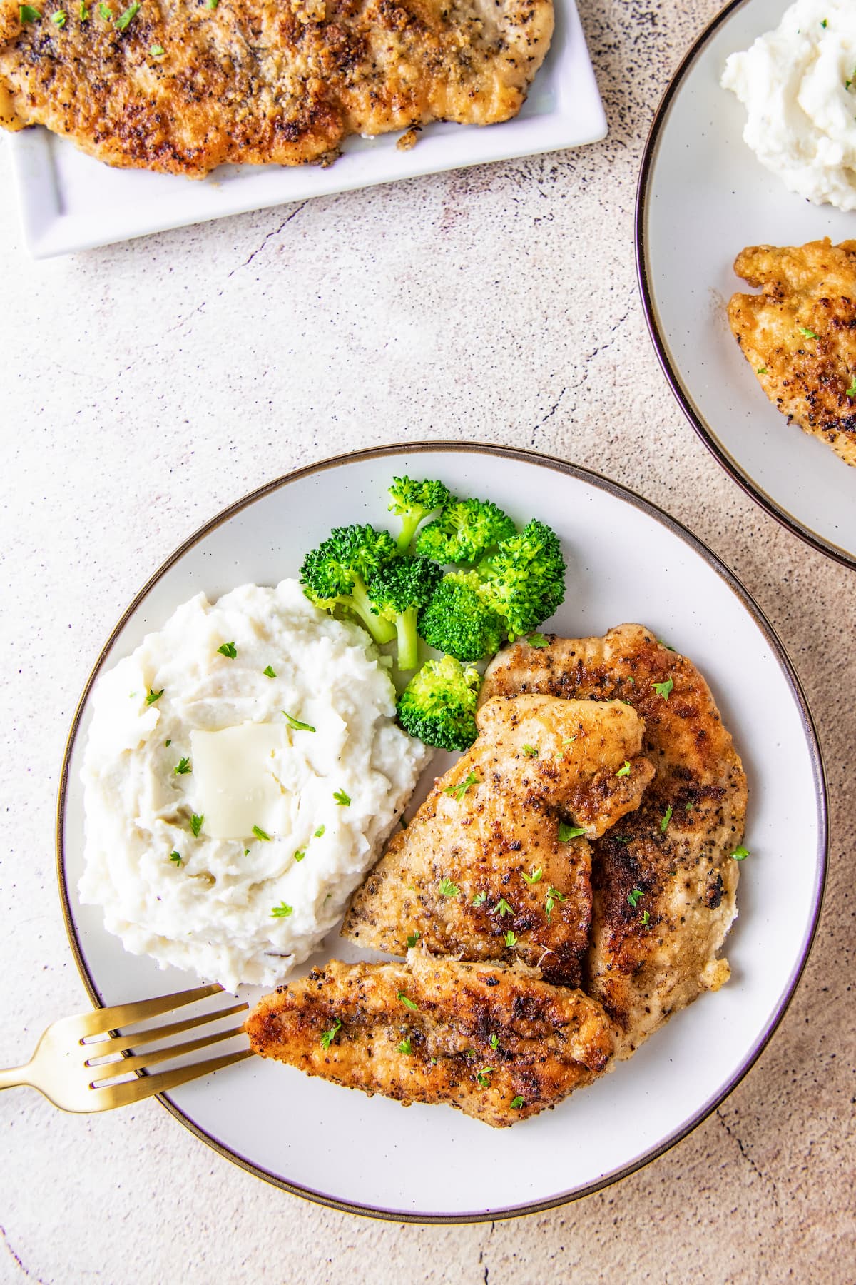 pan seared chicken breast, mashed potatoes, and broccoli