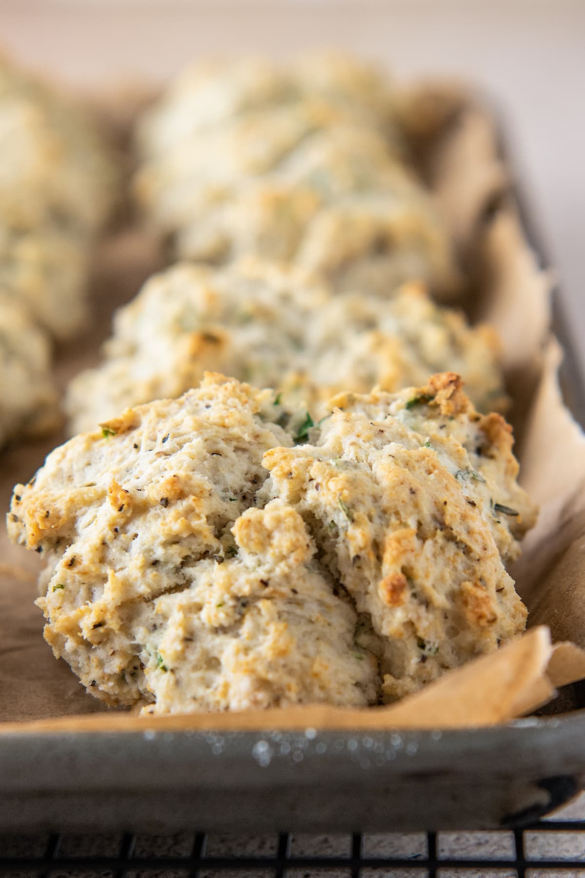 a close up photo of an herb biscuit