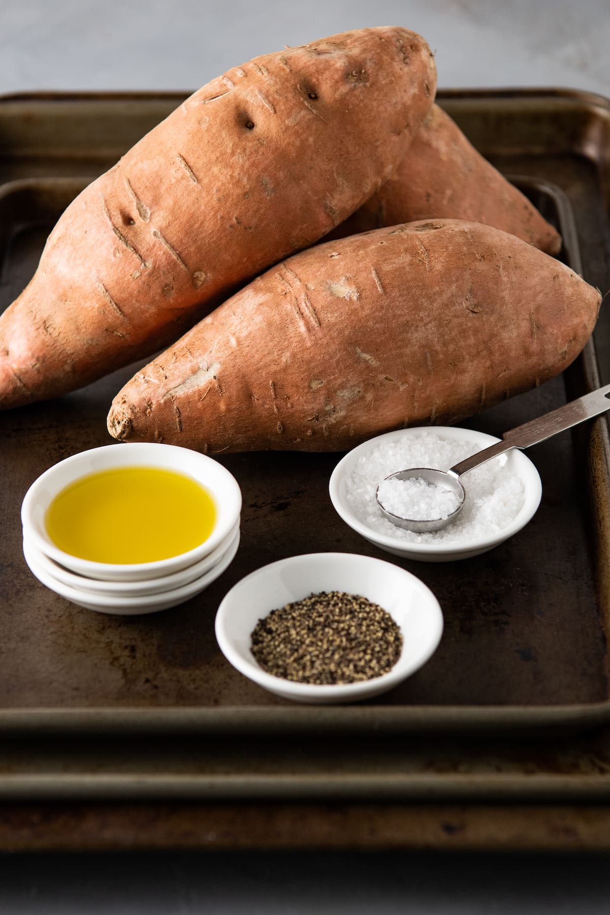 two whole sweet potatoes, olive oil, salt and pepper