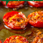 Roasted tomatoes on a cookie sheet.