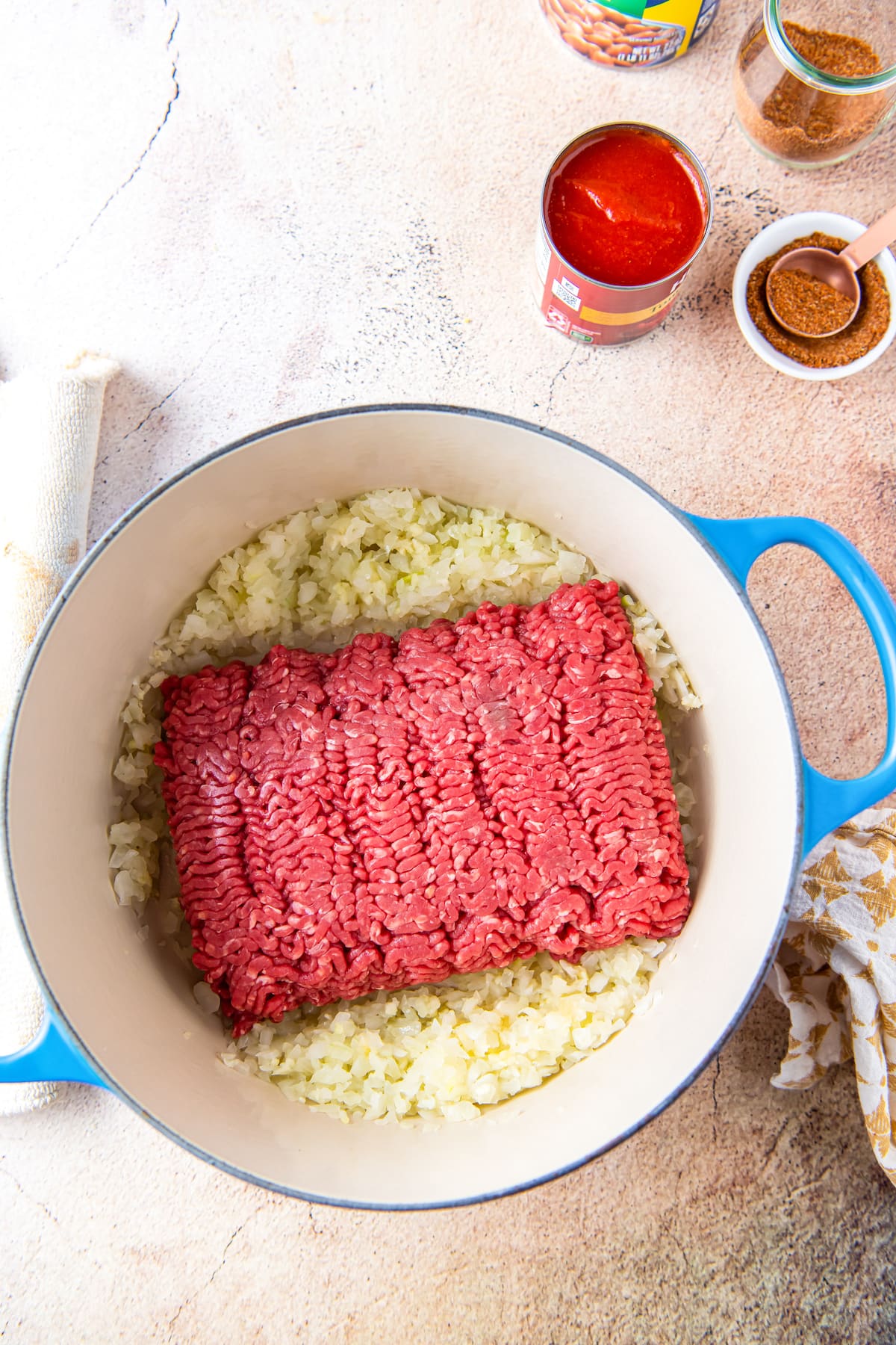 onions and ground beef in a large dutch oven