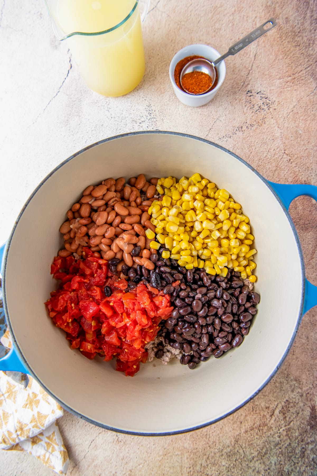 beans, diced tomatoes, and corn in a dutch oven