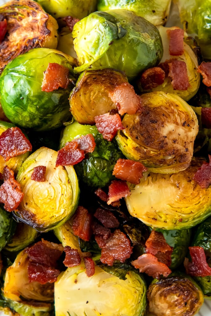 close up of roasted brussels sprouts and bacon pieces