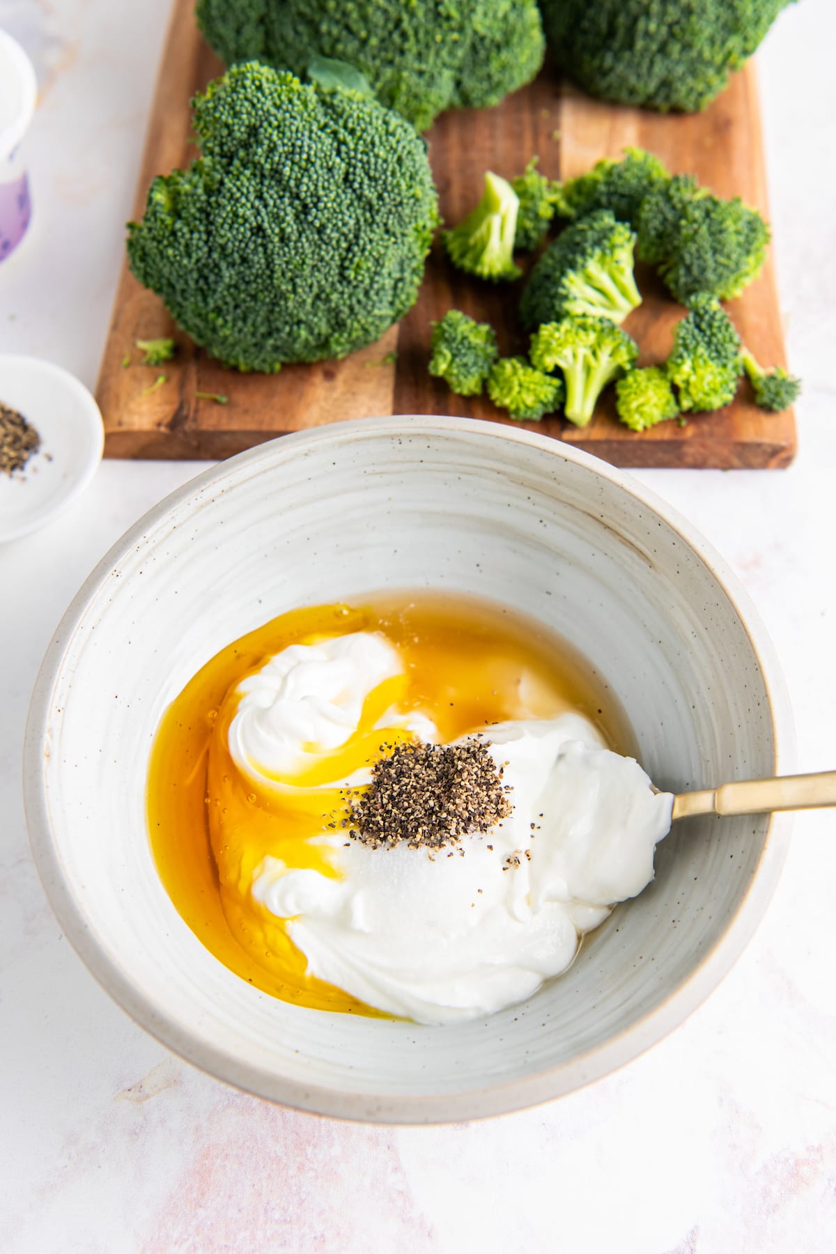 ingredients to make a creamy dressing in a small bowl