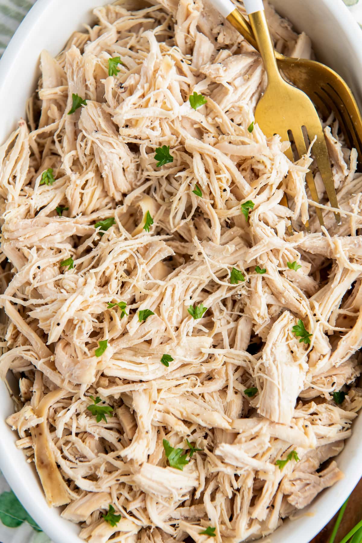 shredded chicken with chopped fresh herbs mixed in