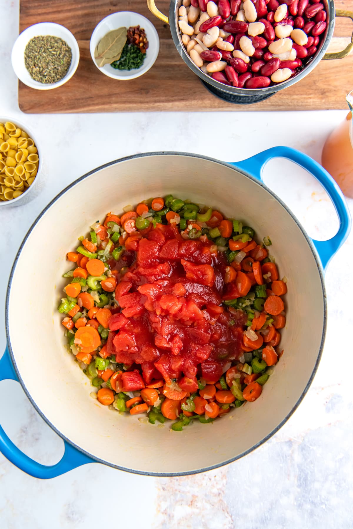 diced vegetables and tomatoes in a large dutch oven