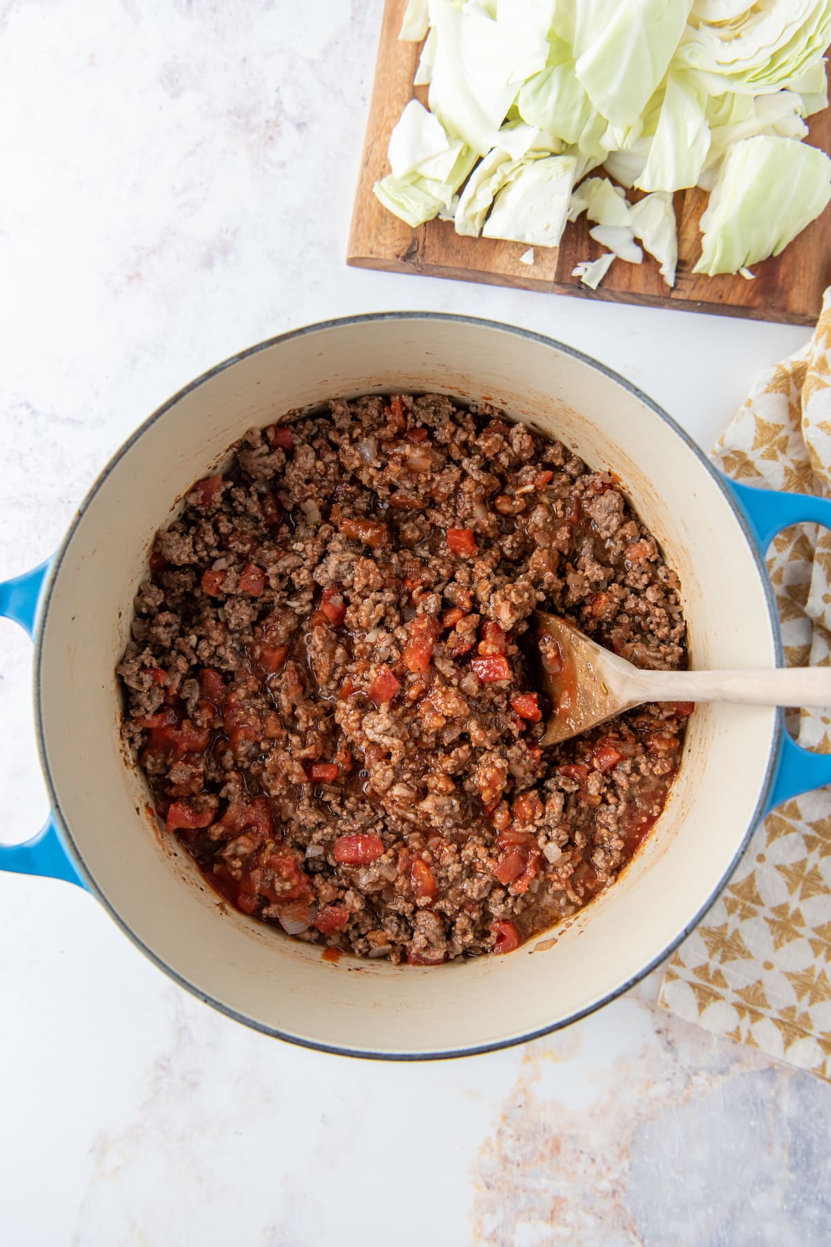 cooked ground beef and tomatoes and ground beef