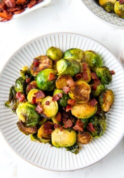 a plate of roasted brussels sprouts with bacon