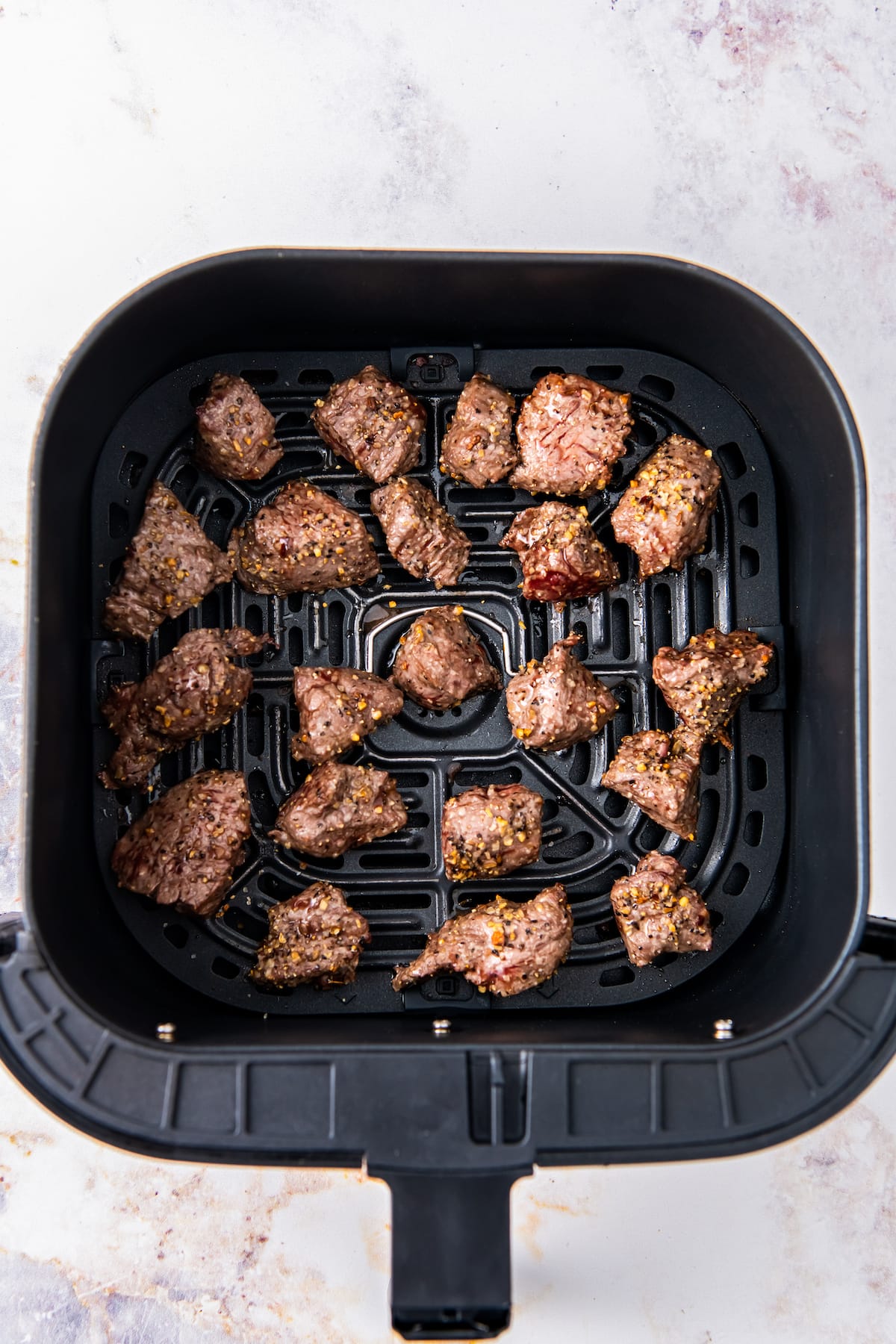 cooked steak bites in an air fryer