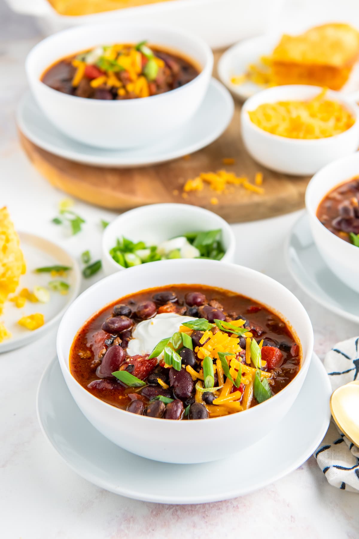 a bowl of chili in a white bowl