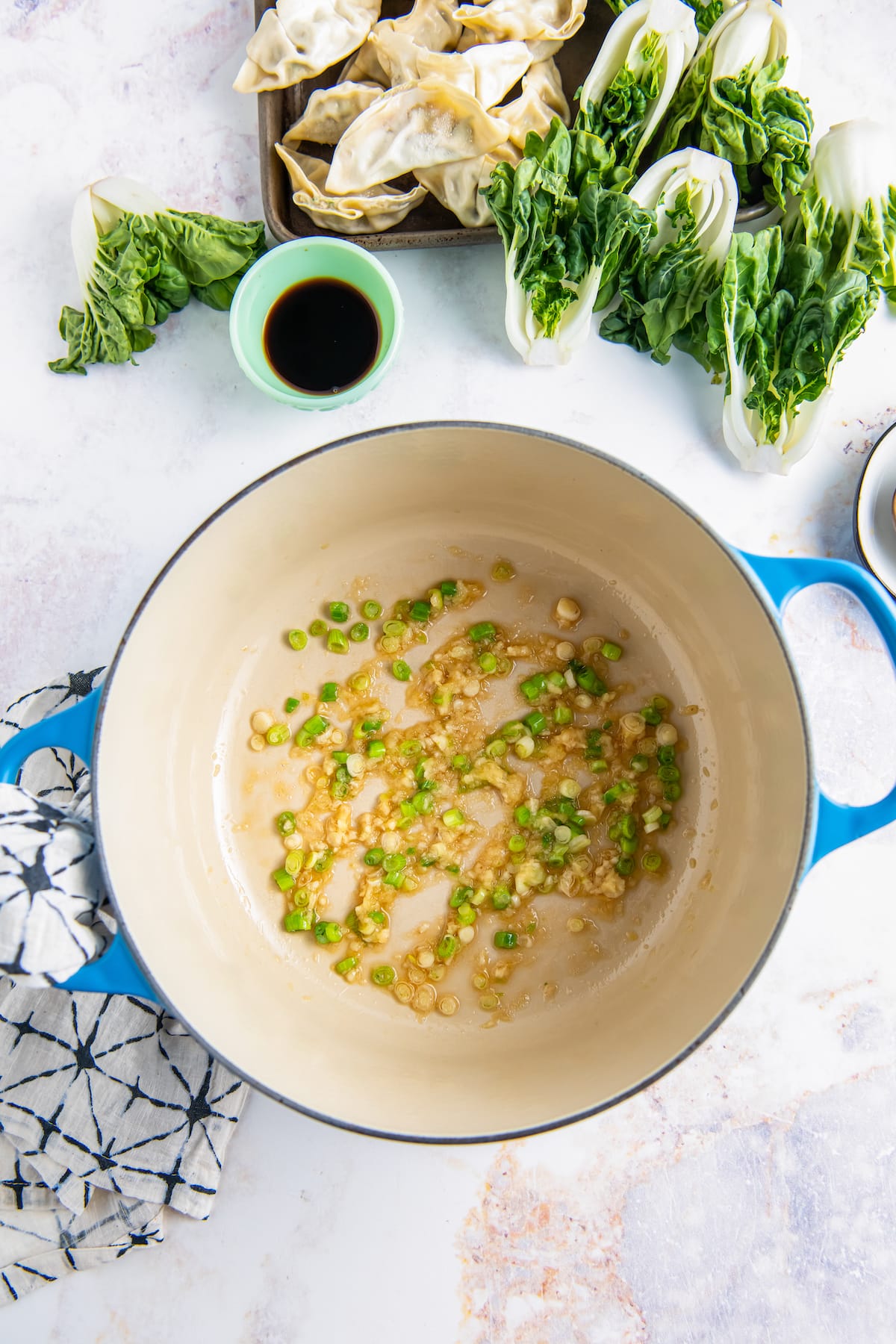 onions, garlic, and ginger in a soup pot