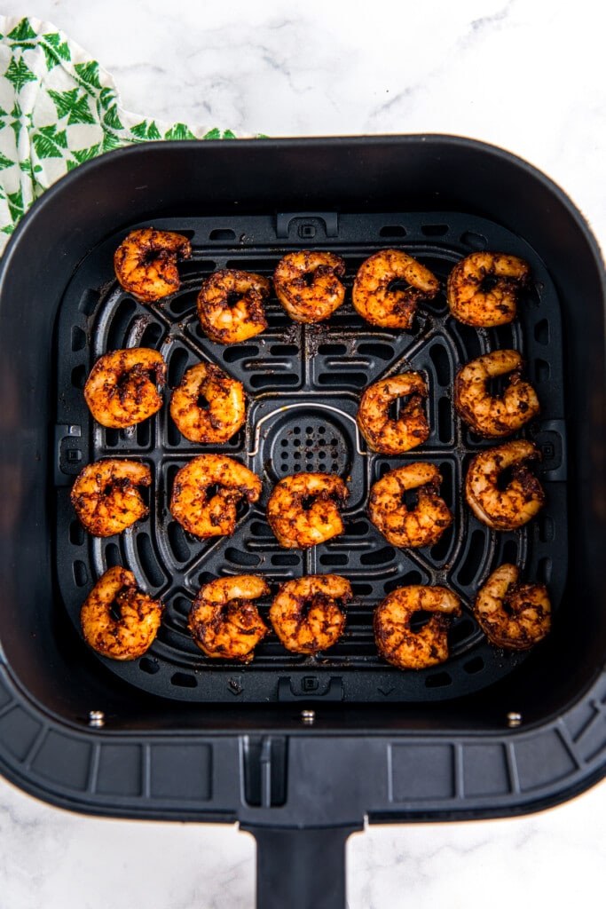 Shrimp cooking in the air fryer.